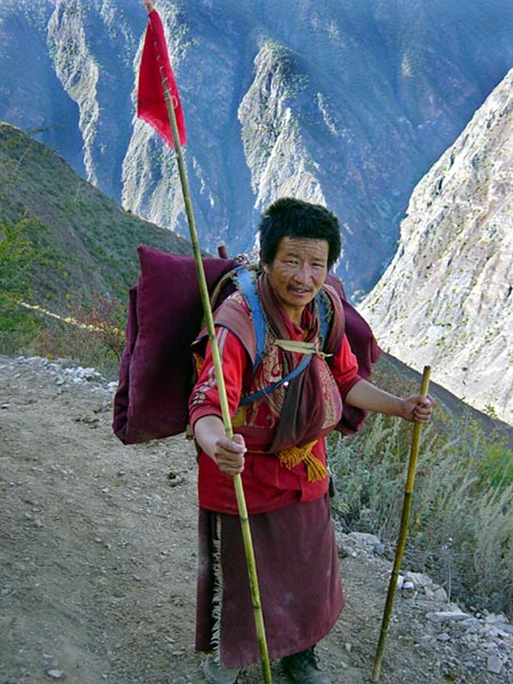 A Tibetan monk on the pilgrimage trail above Gebu.