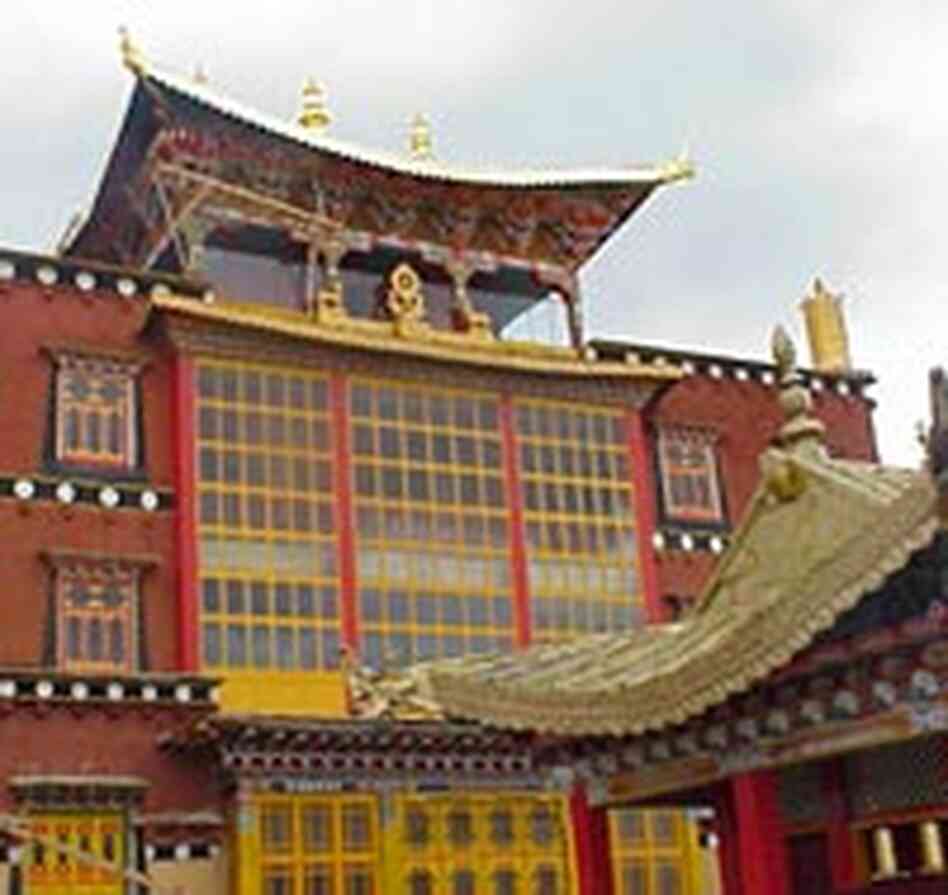 The five-story-tall main prayer hall at Sumtseling Monastery.