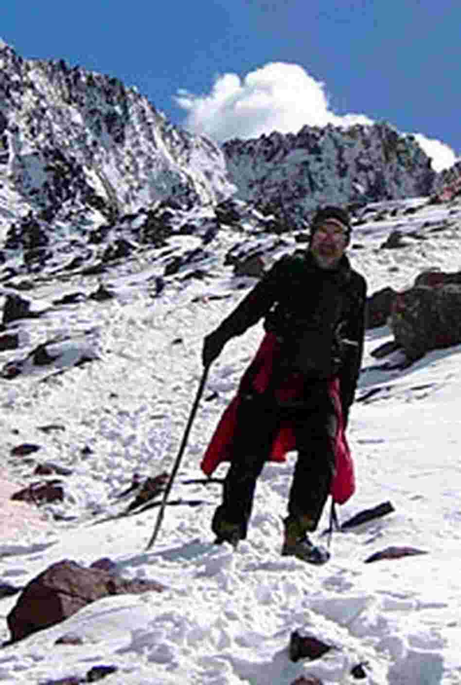 Bill McQuay carefully makes his way down from Shula Pass -- the last mountain pass on the pilgrimage