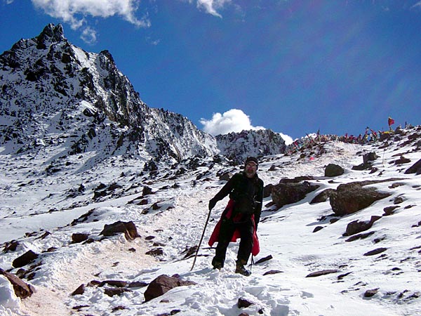 Bill McQuay carefully makes his way down from Shula Pass -- the last mountain pass on the pilgrimage