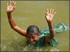 Krishna devotee bathes in the Yamuna River Krishna devotee bathes in the Yamuna River