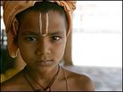A young devotee of the Hindu god Krishna in Vrindavan, India.