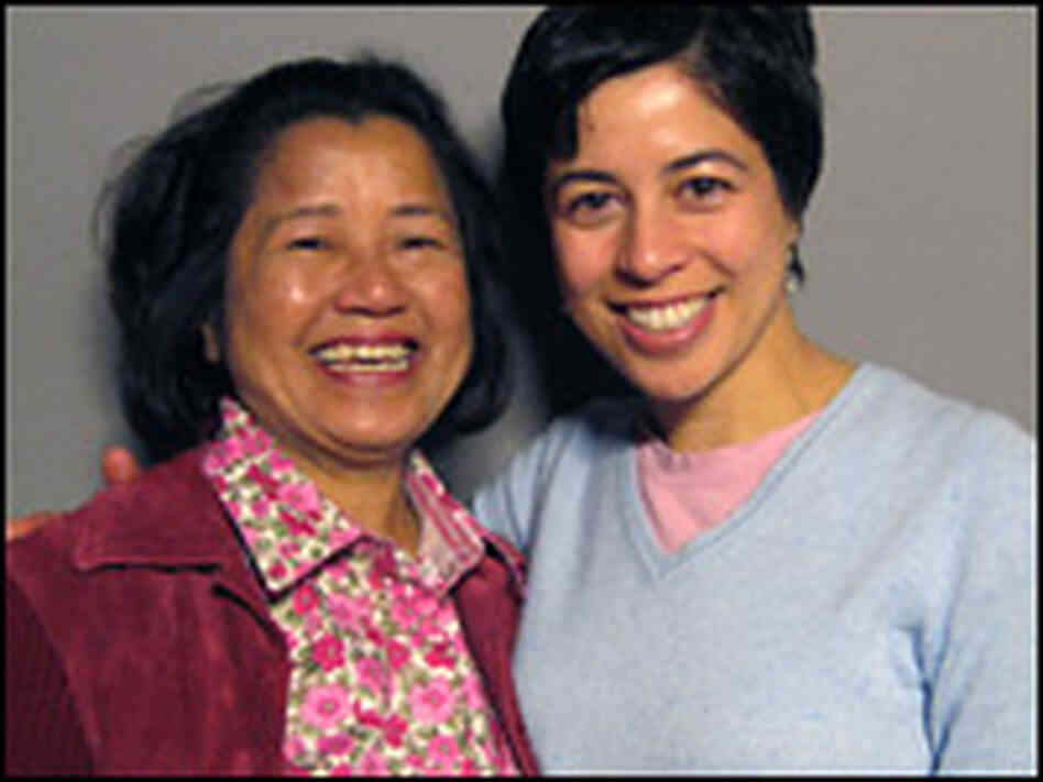 Lourdes Markley with her daughter, Julia, at a StoryCorps booth in New York City. Lourdes Markley with her daughter, Julia, at a StoryCorps booth in New York City.