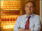 Dave Isay at the StoryCorps booth in Grand Central Terminal.