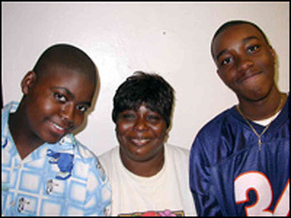 Jennie Clark, grandmother of Lamont, with Patrick Volf and Terrence Boykins. Jennie Clark, grandmother of Lamont, with Patrick Volf and Terrence Boykins.