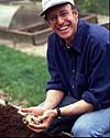 Michael Pollan with a potato-eating grin