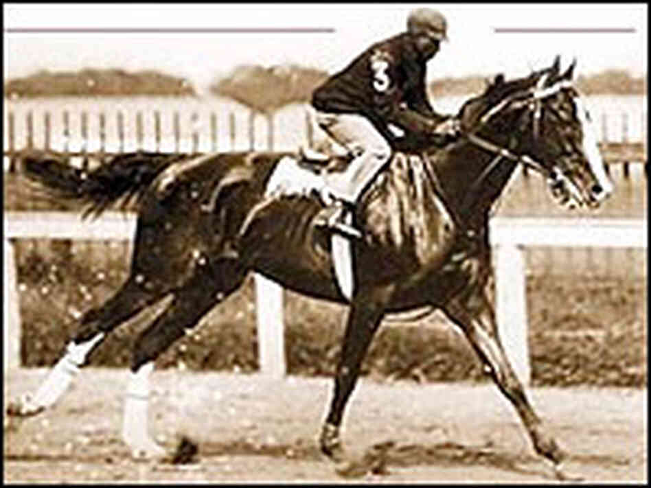 Jimmy Winkfield aboard a horse Jimmy Winkfield aboard a horse