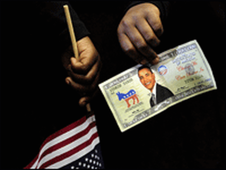 Child holds American flag and fake bank bill