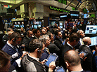 Traders on the floor of the New York Stock Exchange Traders on the floor of the New York Stock Exchange