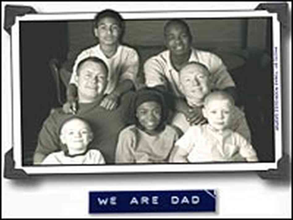 Steven Lofton and Roger Croteau with their five foster children.