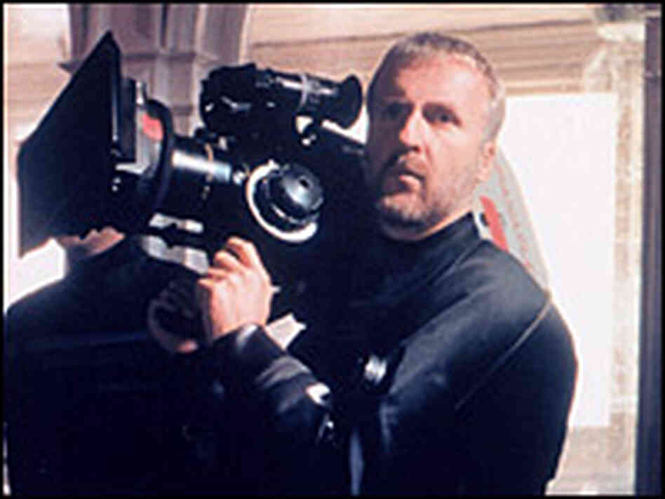 James Cameron on the set, balancing camerawork with diving. James Cameron on the set, balancing camerawork with diving.