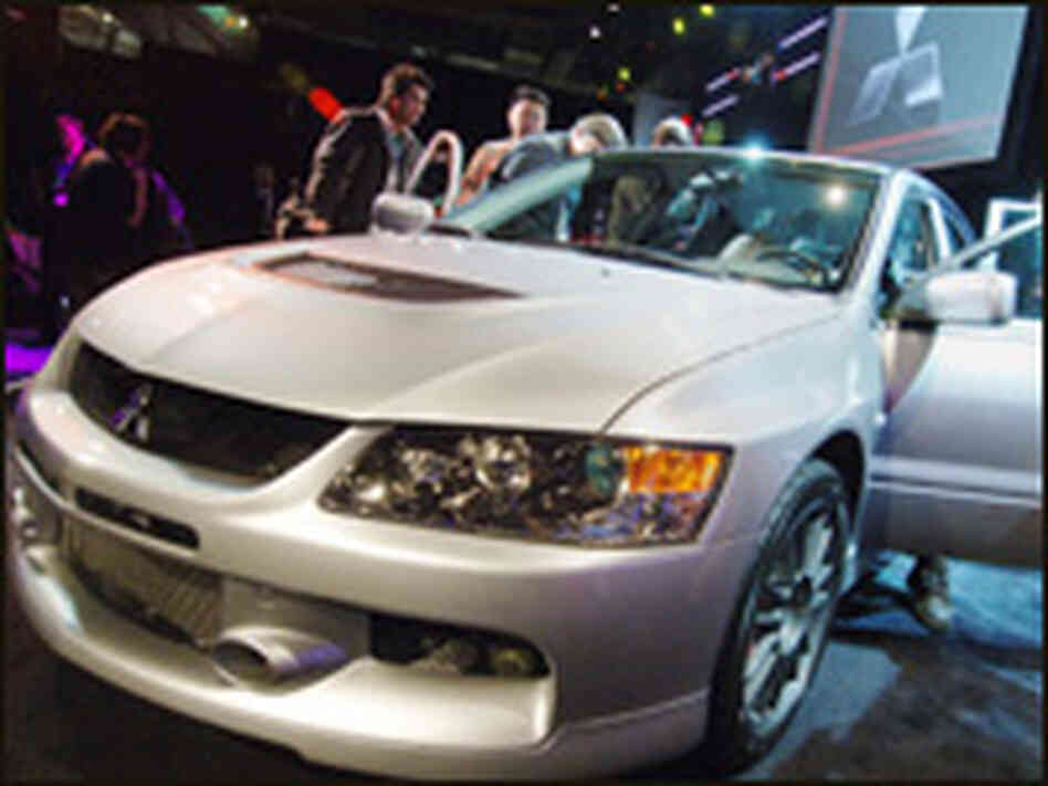 Mitsubishi unveiled the 2006 Mitsubishi Lancer Evolution IX at the New York International Automobile Mitsubishi unveiled the 2006 Mitsubishi Lancer Evolution IX at the New York International Automobile