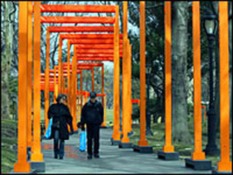 People walk through art installation in New York's Central Park People walk through art installation in New York's Central Park