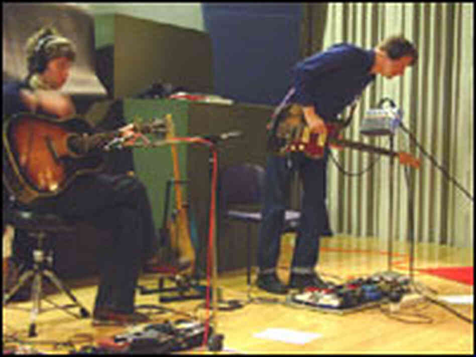 Wilco band members Pat Sansoe (left) and Nels Cline. Wilco band members Pat Sansoe (left) and Nels Cline.