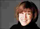 Nora Ephron in a black turtleneck sweater.