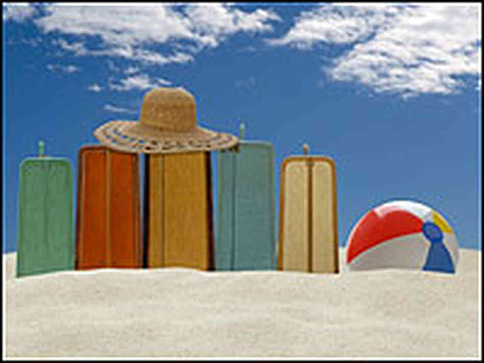 Suitcases in the sand. Suitcases in the sand.