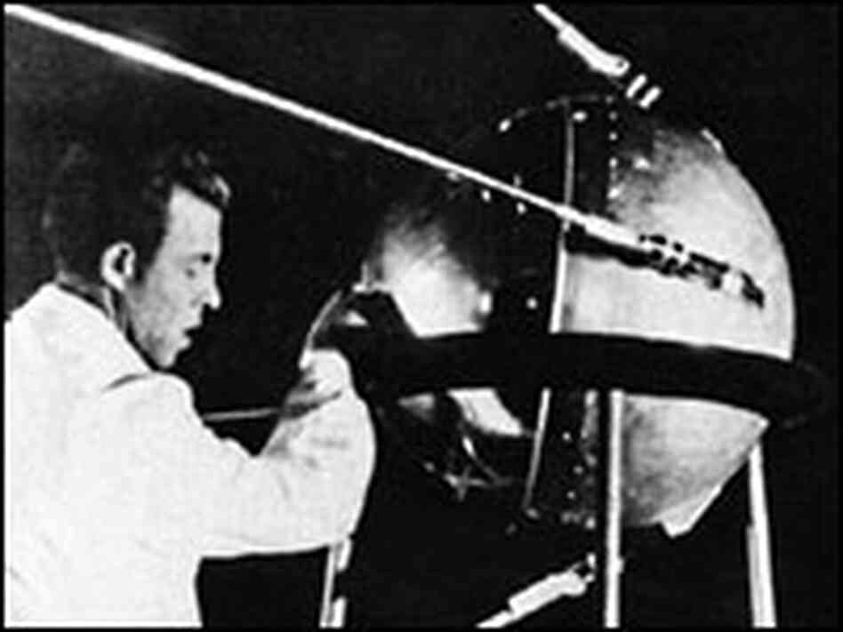 A technician prepares Sputnik. A technician prepares Sputnik.