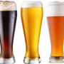 Three tall glasses of beer. Three tall glasses of beer.