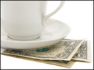 Money left under a coffee cup. Money left under a coffee cup.