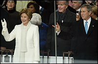 U.S. President George W. Bush and first lady Laura Bush make the 