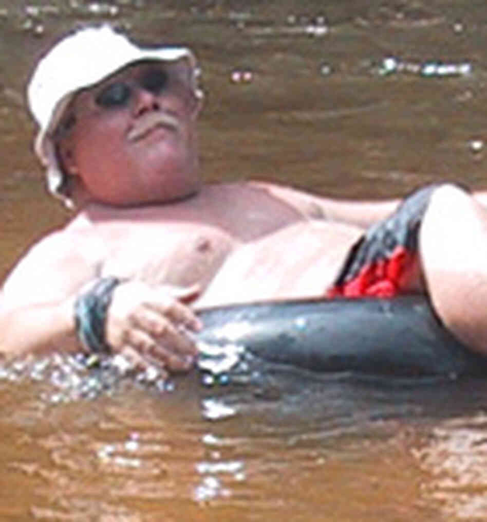 Reggie Smith inner tubing on the Styx River in southern Alabama. Reggie Smith inner tubing on the Styx River in southern Alabama.