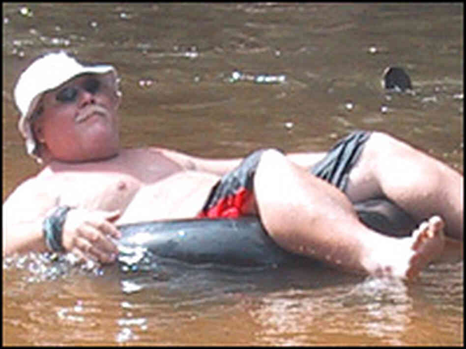 Reggie Smith inner tubing on the Styx River in southern Alabama. Reggie Smith inner tubing on the Styx River in southern Alabama.