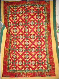 A quilt by Lucy Marie Mingo.
