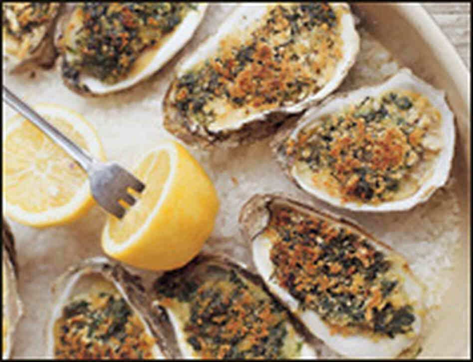 Baked oysters with slab bacon and wilted greens. Baked oysters with slab bacon and wilted greens.