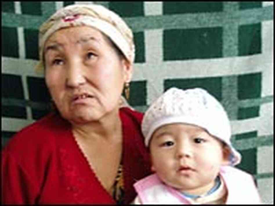 Selma Orazova holds her HIV-infected grandson, Sayat. Selma Orazova holds her HIV-infected grandson, Sayat.