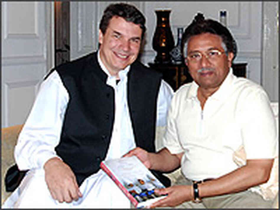 Greg Mortenson and Pakistan's Pervez Musharraf.