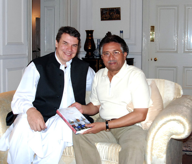 Greg Mortenson and Pakistan's Pervez Musharraf.