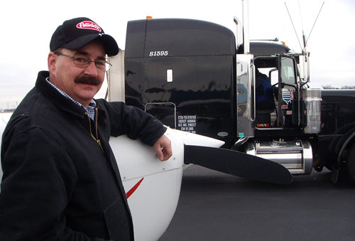 Steve Brosnan stands by his truck.
