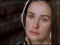 Demi Moore as Hester Prynne.