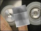 Researchers display an x-ray photograph of a finger generated by peeling sticky tape. Researchers display an x-ray photograph of a finger generated by peeling sticky tape.