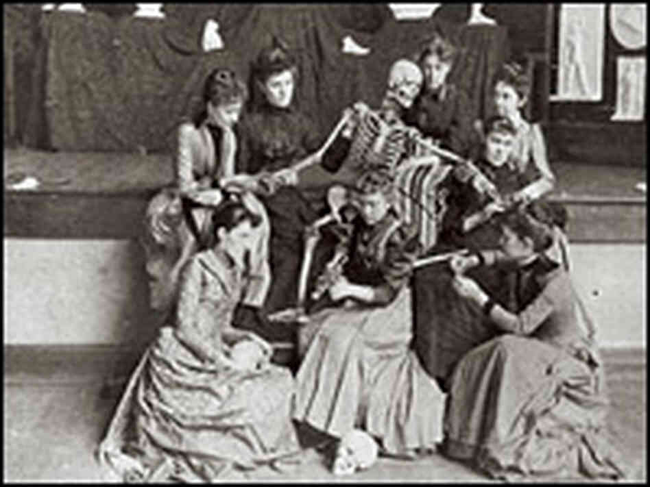 Students pose with a skeleton. Credit: Miami University Libraries