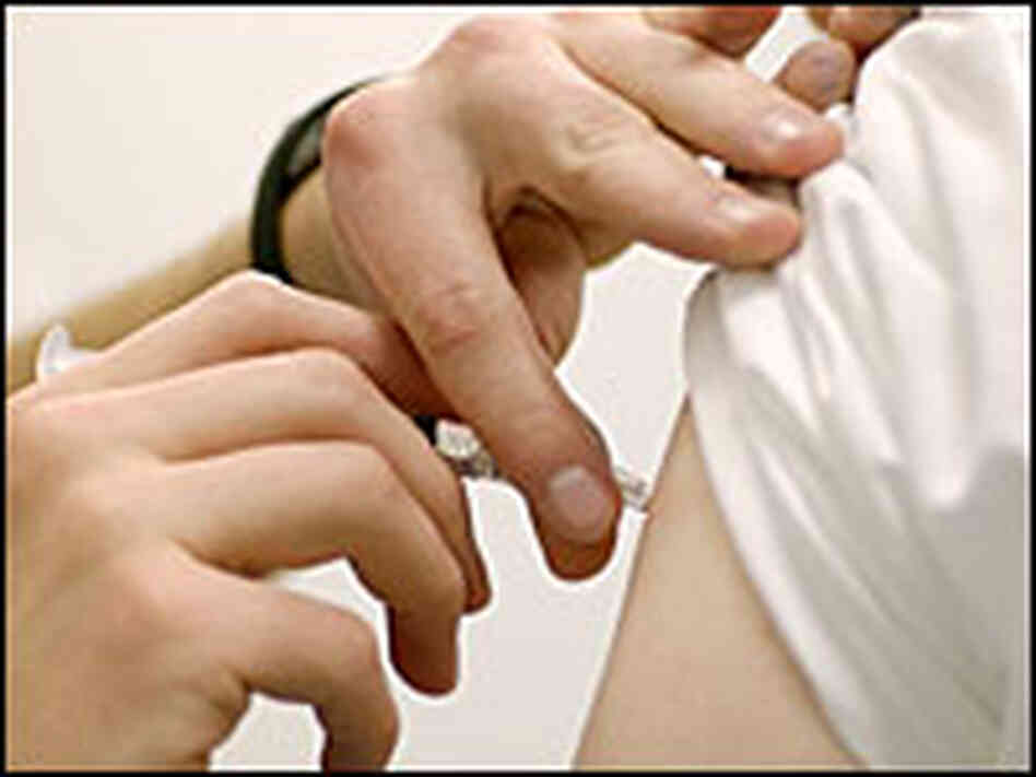 Patient receiving an injection. Patient receiving an injection.