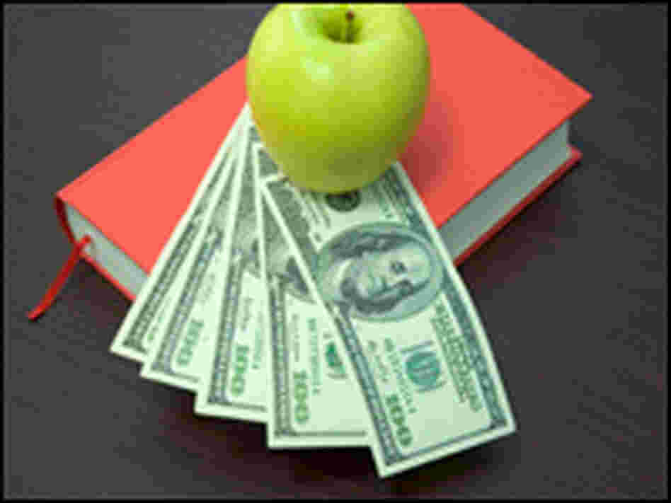 An apple, books and money. An apple, books and money.