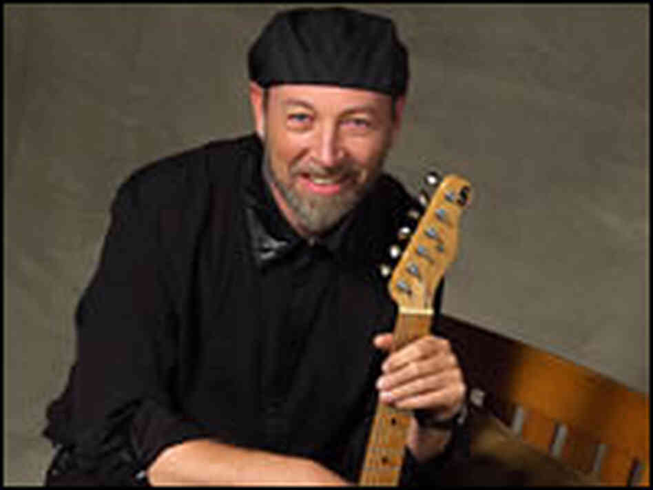 Richard Thompson, with a guitar Richard Thompson, with a guitar