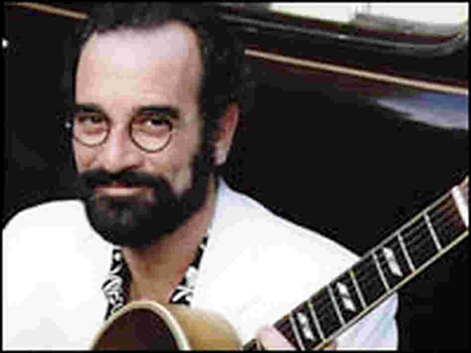 In addition to blues, Bob Brozman plays guitar in many styles. In addition to blues, Bob Brozman plays guitar in many styles.