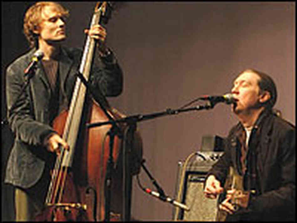 The Wood Brothers: Chris, left, and Oliver on stage at World Cafe Live. The Wood Brothers: Chris, left, and Oliver on stage at World Cafe Live.
