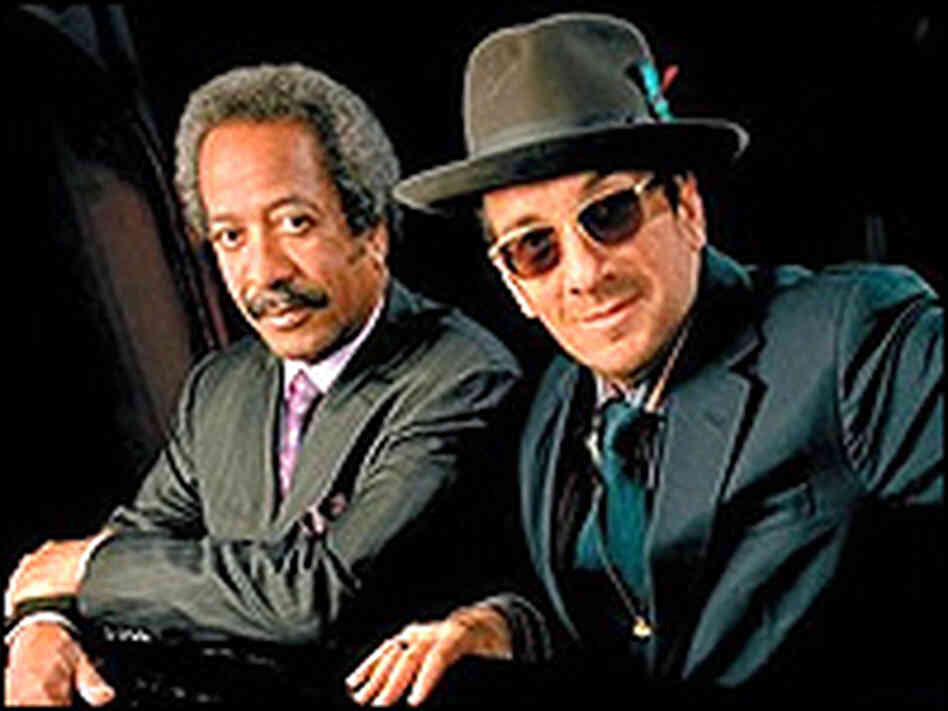Allen Toussaint and Elvis Costello. Allen Toussaint and Elvis Costello.