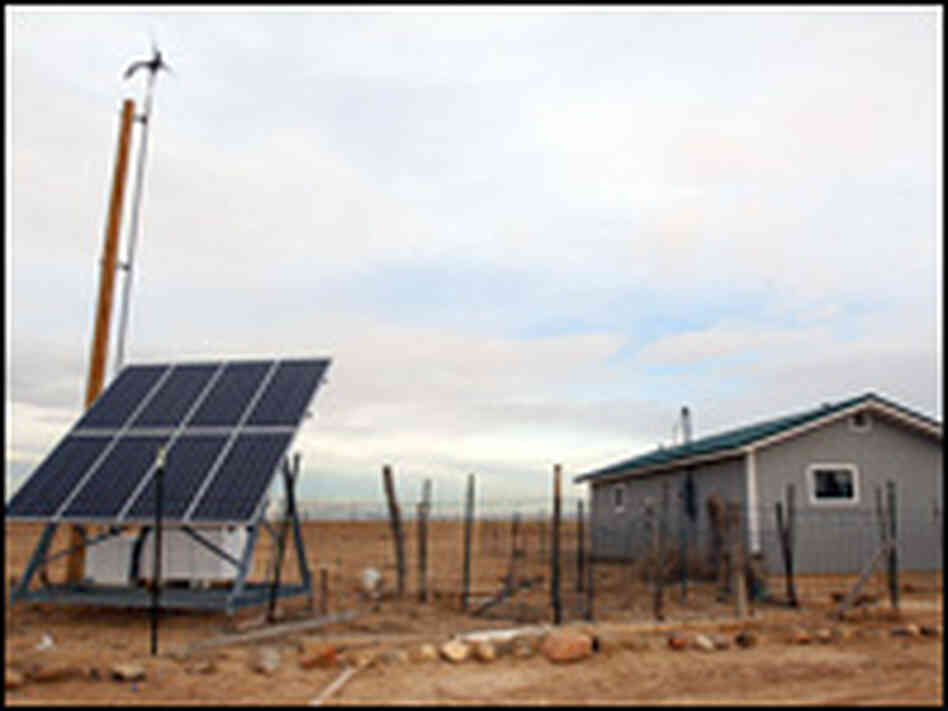 A solar panel and wind turbine in New Mexico.