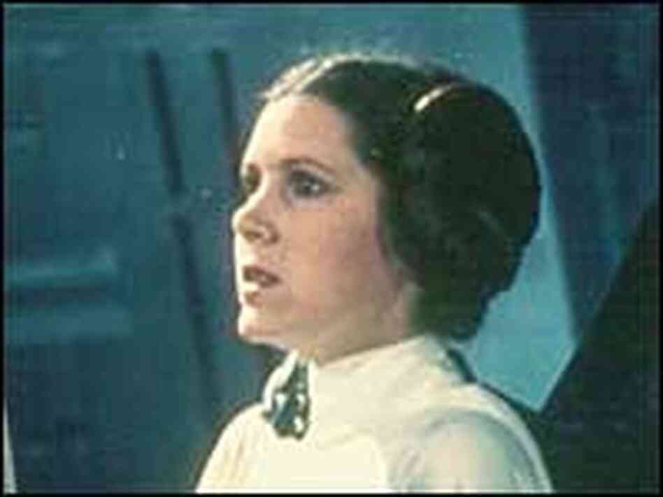 Fisher in her signature role, Princess Leia. Fisher in her signature role, Princess Leia.