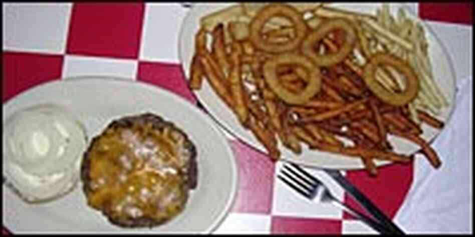Burger and an assortment of fries at Paul's Palace. Burger and an assortment of fries at Paul's Palace.