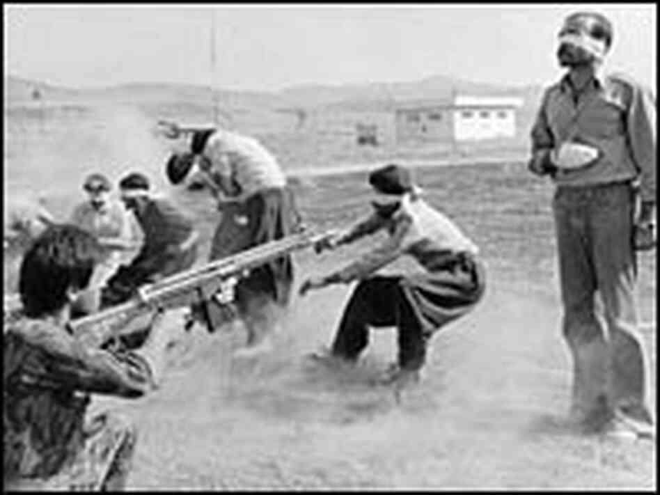 A government firing squad executes nine Kurdish rebels and two former police officers