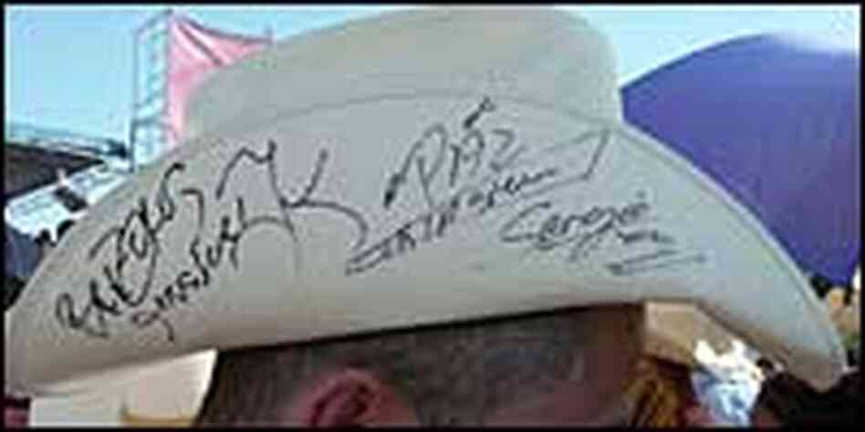 Duranguense fans wear  hats with tall sides often signed by Duranguense  musicians.