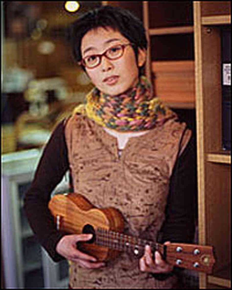 Ayano Tsuji poses with her ukulele. Ayano Tsuji poses with her ukulele.