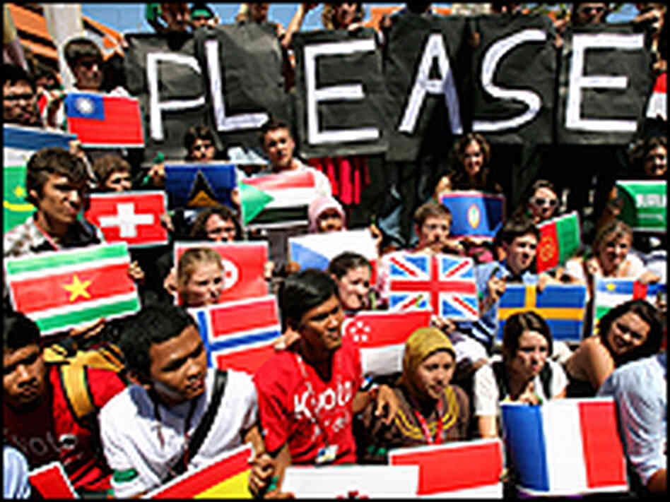 Environmental activists and supporters shout slogans during a demonstration on bali. Environmental activists and supporters shout slogans during a demonstration on bali.
