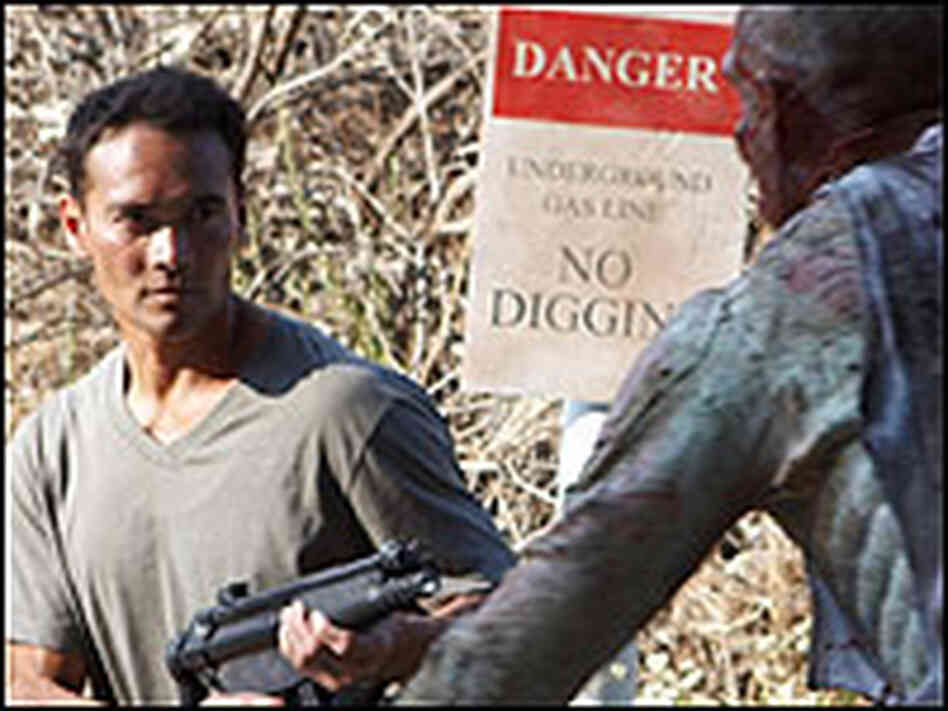 Renchard, played by Mark Dacascos, battles mutant creatures.