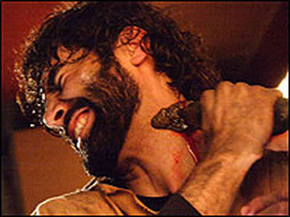 Brujo, played by Alby Castro, defends himself from a viper.